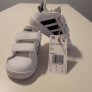 Brand new with tags. Adidas Baby sneakers size 4.
